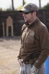 Solving Problems One Hand at a Time Picture 1 – The author about to shoot a one-day handgun course just three days after breaking his hand. Notice the Ares Gear Ranger belt and tactical Coban wrapped cast.
