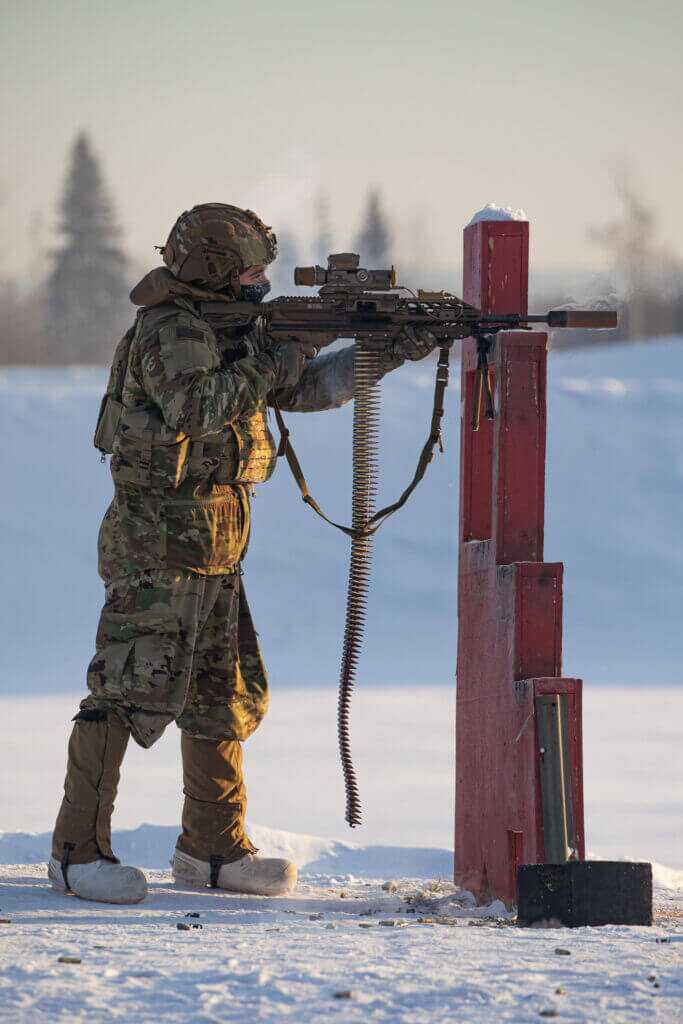 soldier shooting MMG