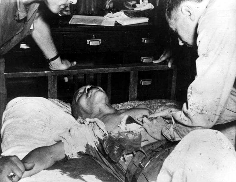 Hideki Tojo after self-inflicted gunshot, American medics present