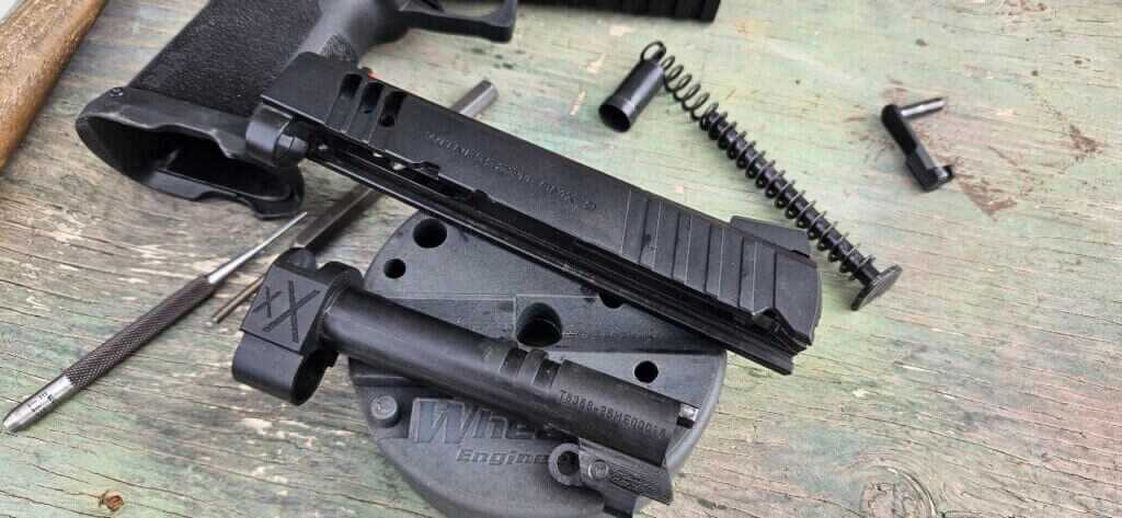 Slide cuts and one-piece compensated barrel on the EAA Witness2311 CMXX