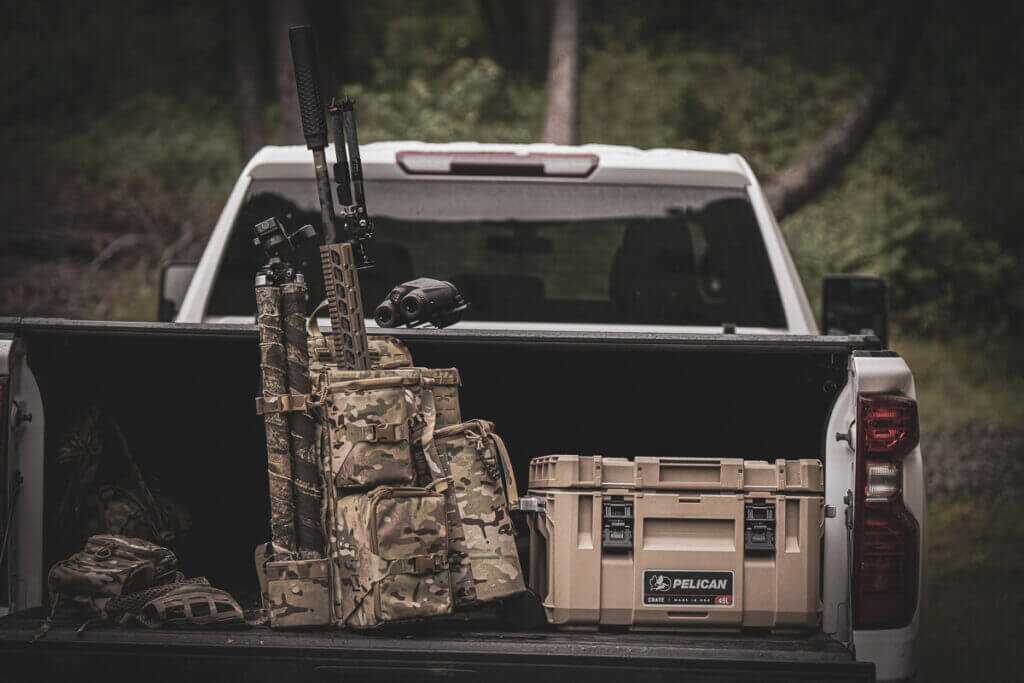 Pelican CRATE 45L loaded with optics and range gear for waterproof dustproof truck bed storage