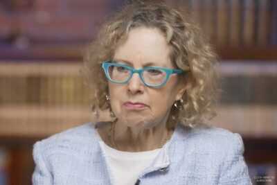 Heather Mac Donald speaks during an interview discussing gun violence, policing, crime statistics, and media coverage.