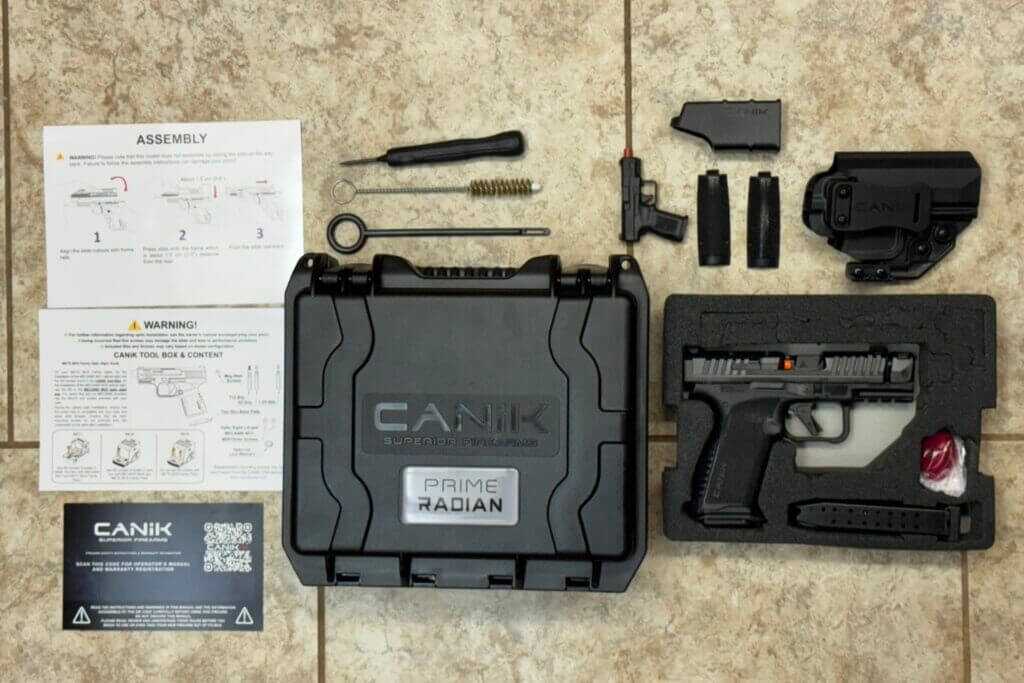CANiK PRIME RADIAN case contents with magazines, holster, tools, backstraps, and accessories