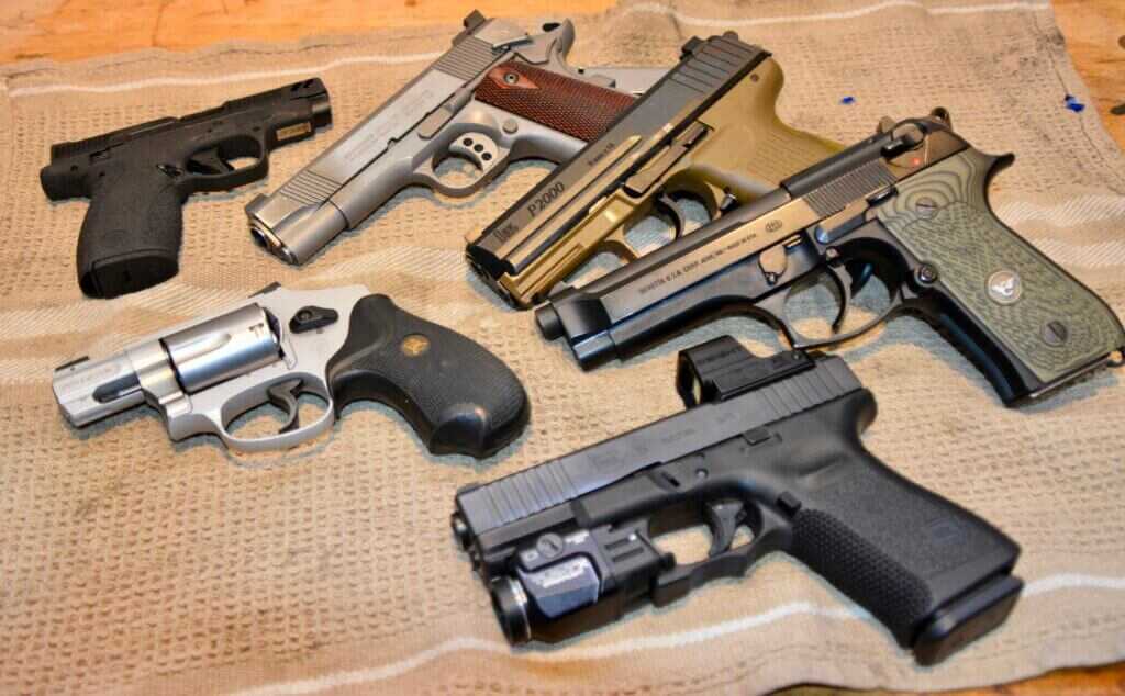Handgun action types including revolver, hammer fired, and striker fired pistols