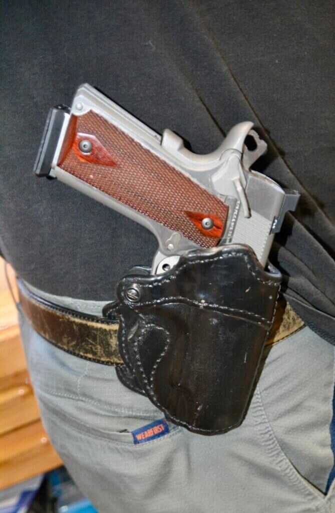 Colt Combat Commander 1911 carried cocked and locked in condition 1