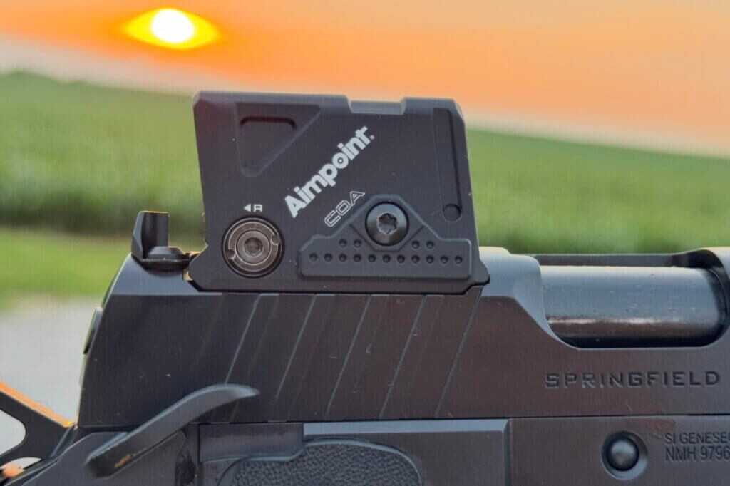 Aimpoint COA 3.5 MOA enclosed-emitter red dot mounted on the Springfield Prodigy