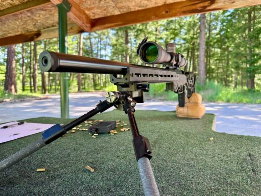 Savage 110 RF Elite Precision .22 LR rifle viewed from the muzzle on a shooting bench