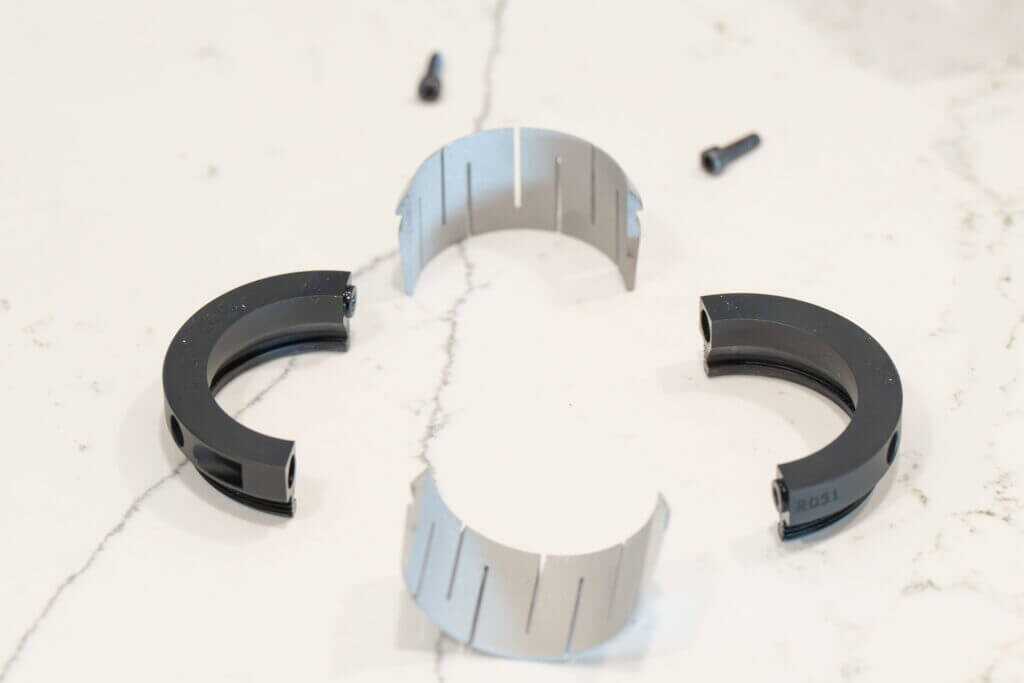 Force 360 scope mount collet components illustrating even radial pressure around round objects