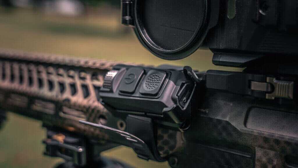 Customizable Nocpix H50R PRO remote mounted on a rifle handguard for autofocus and ranging controls