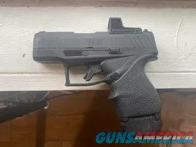 Taurus GX4 9mm Micro-Compact w/ RomeoZer...