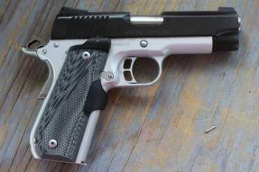 Kimber Master Carry Pro The rear sight is a traditional pyramid shape, which means it won't snag, but it would be hard to use for one handed charging.