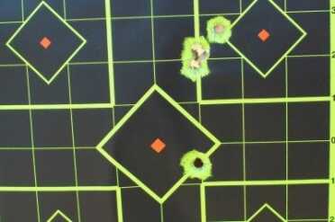 Kimber Master Carry Pro This target shows the shots made with the laser, and then one made from the same location with the irons. All were aimed at the center.