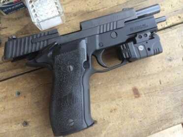 Sig Sauer's Single Action Sensation: The P226 Elite SAO Slide-lock view from the right side.
