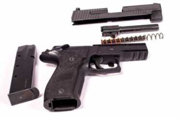 Sig Sauer's Single Action Sensation: The P226 Elite SAO Field stripped for cleaning.