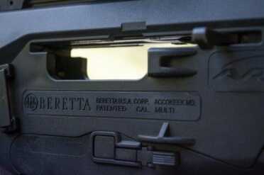 Ejection ports are on both sides and always open.