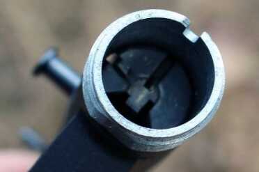 The Surprising Survival Rifle: Henry's AR-7--Review The barrel screws right onto the receiver, and can be tightened by hand.