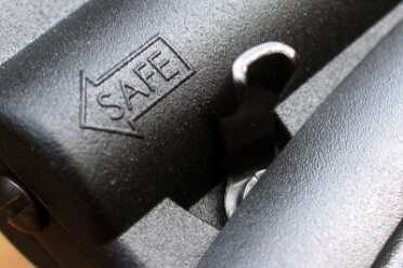 The Surprising Survival Rifle: Henry's AR-7--Review The safety is easy to bump out of safe.