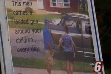 Woman posts sign of concealed carrier to warn neighborhood Here's a image of the sign, which has a caption, "This man carries a loaded gun around your children every day." (Photo KAAL-TV)