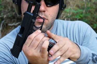 H&K's Sub Compact P2000sk--Where's the Love? Clearing your palm from the mag well makes loading easier.
