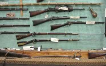 Some of the rifles in the Cohen's shop.  Two "Mississippi" Rifles on the bottom.  Also the trapdoor with the saddle holster is rare. 