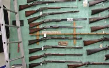 Some "Guns That Won the West" and two Colt Lightnings, a big frame and a small. 