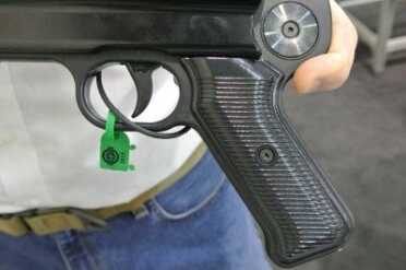 WWII German MP40 in 9mm - SHOT Show 2015 In pistol configuration. The stock goes on the round spot.