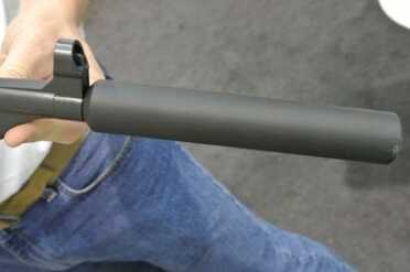 WWII German MP40 in 9mm - SHOT Show 2015 Version with a fake silencer to make the barrel length over 16". This one is on .22, they might make on like it in 9mm.