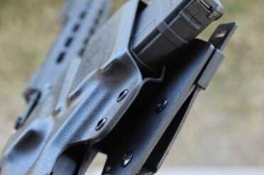 Everyone Needs an AR Holster The holster is open on the bottom to allow for mags to poke through.