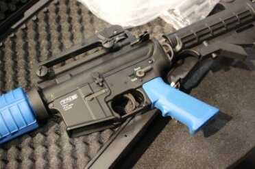 Blue furniture helps identify the training guns.