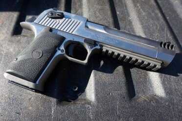 New All Stainless Desert Eagle--Gun Review The whole gun comes in over 10 inches, and weighs as much as two 1911s.