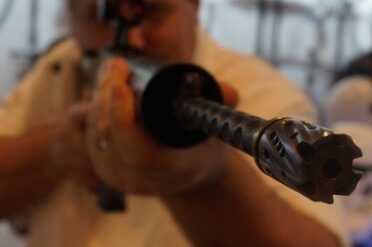 The OIP 3.8 Pound AR--SHOT Show 2015 Even the barrel has been dimpled.