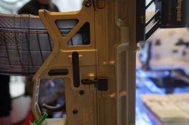 The OIP 3.8 Pound AR--SHOT Show 2015 And the OIP is still strong enough to handle the recoil.