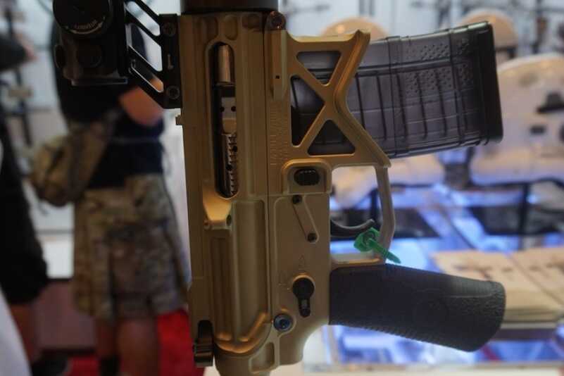 The OIP 3.8 Pound AR--SHOT Show 2015 No dust covers. They weigh too much.