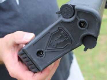 Mule Tac--Glock In A Stock Review The butt. The round things on the side can store extra batteries.