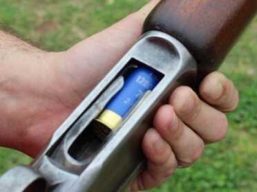 Shooting History-Winchester's Widow Maker?--Old Gun Review Loading the magazine.