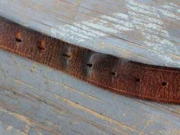 Belts with holes mean small adjustments. Here you can see how much my weight has fluctuated over 15 years. A roller buckle will keep the belt from stretching so badly.