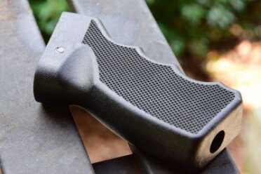 The 100% American Made AK: The Ras-47 Grooved grips are one-size-fits-all, which isn't exactly true. That said, they're easily replaced.