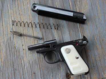 The Used Market: The Pocket .25 Field stripped. Note the fixed barrel.