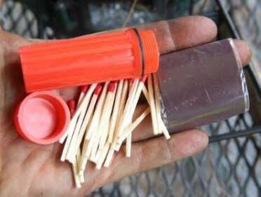 Prepping 101: Starting Fires with Sparks and the Sun This waterproof matchbox and matches is a buck at Walmart.