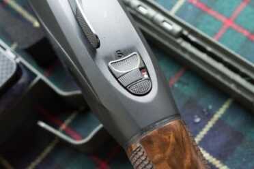 Benelli 828U--The Future of the Over-Under Shotgun The safety and barrel selector switch is fairly standard.