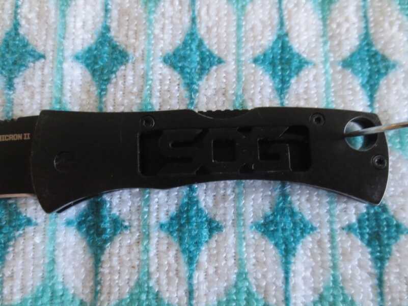 SOG's Micron II: Keychain Knife "SOG" skeletonized in the handle. Not a big fan of it, but whatever.