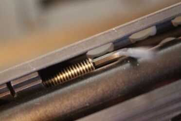 bolts inside the forend need to be snugged down. This locks it in place.