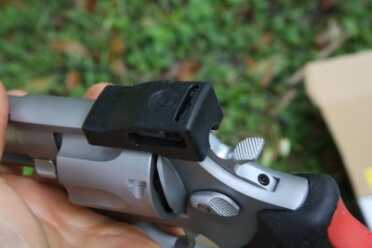 Taurus Raging Bull .44 Mag Revolver - Return of the Classic Model 444 I guess this sight protector is if you want to carry the gun in an open holster.