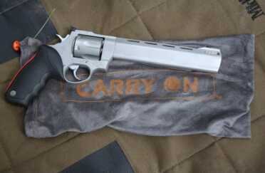 Taurus Raging Bull .44 Mag Revolver - Return of the Classic Model 444 My gun came with this velvet Carry On bag, two keys for the hammer lock, and a rubber sight protector.