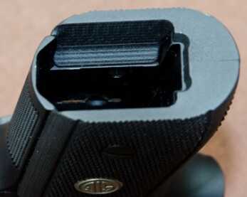 SIG SAUER’S Classic P225 Re-Born Feeding a fresh magazine into the magwell is fast and easy.
