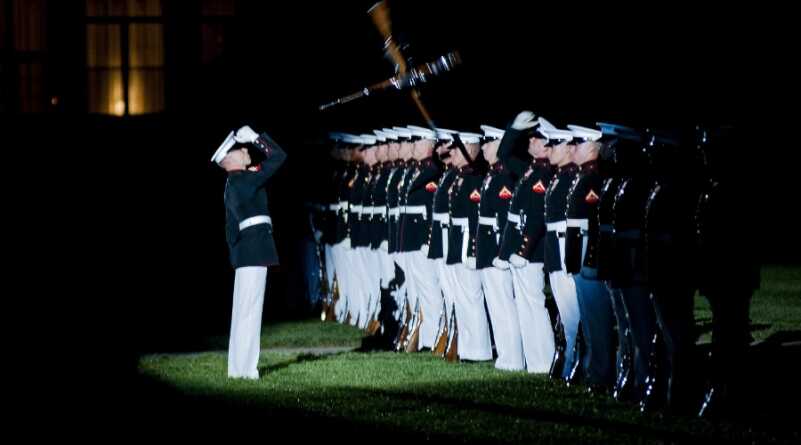 The Marine Corps Silent Drill Platoon performs during a parade held at Marine Barracks Washington, D.C., in honor of the 60th anniversary of the Korean War