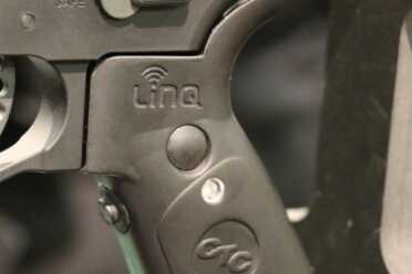 Crimson Trace Has A New AR Laser/Light--SHOT Show 2016 The grip on the Linq System.