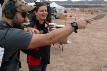 There you can see champion knife thrower Melody Cuenca giving Jacob a brief tutorial on how to get the job done. 