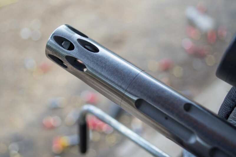We Shoot the New Smith & Wesson Victory .22 LR Pistol The muzzle device on the Volquartsen fluted barrel.