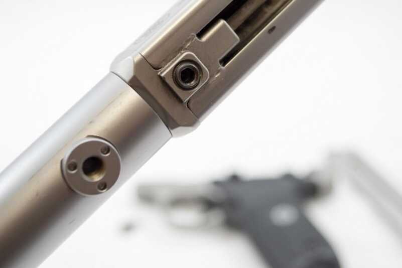 We Shoot the New Smith & Wesson Victory .22 LR Pistol Once field stripped, the barrel locking screw is exposed.